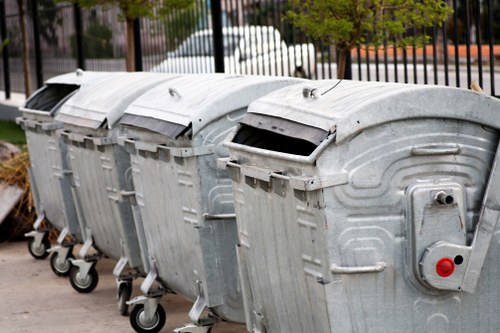 Sorting bins and separated recyclables at a local transfer station